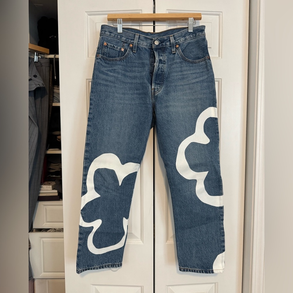 Classic straight Levi’s with white floral pattern. Worn once!